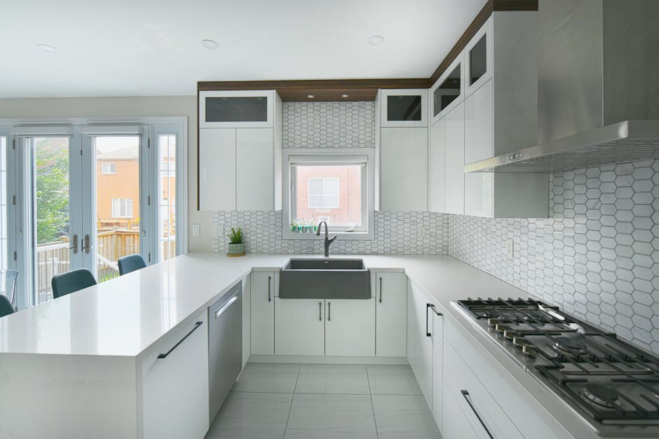 Professional kitchen renovation team reviewing plans